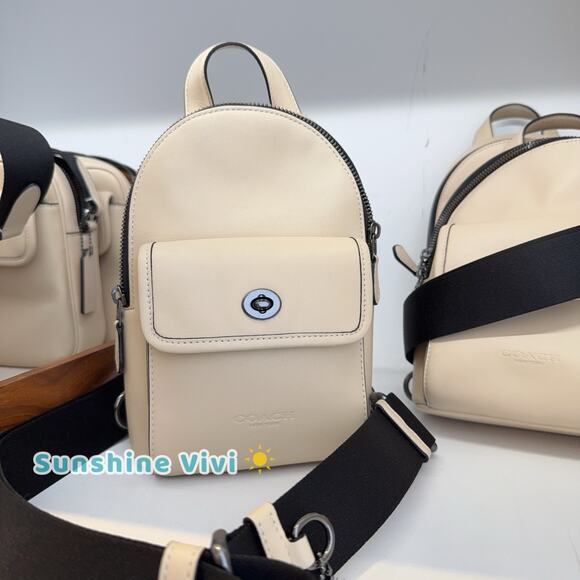 NWT COACH Small Turnlock Sling Pack Smooth Leather Backpack Bag Ivory CAJ28 - Picture 1 of 11